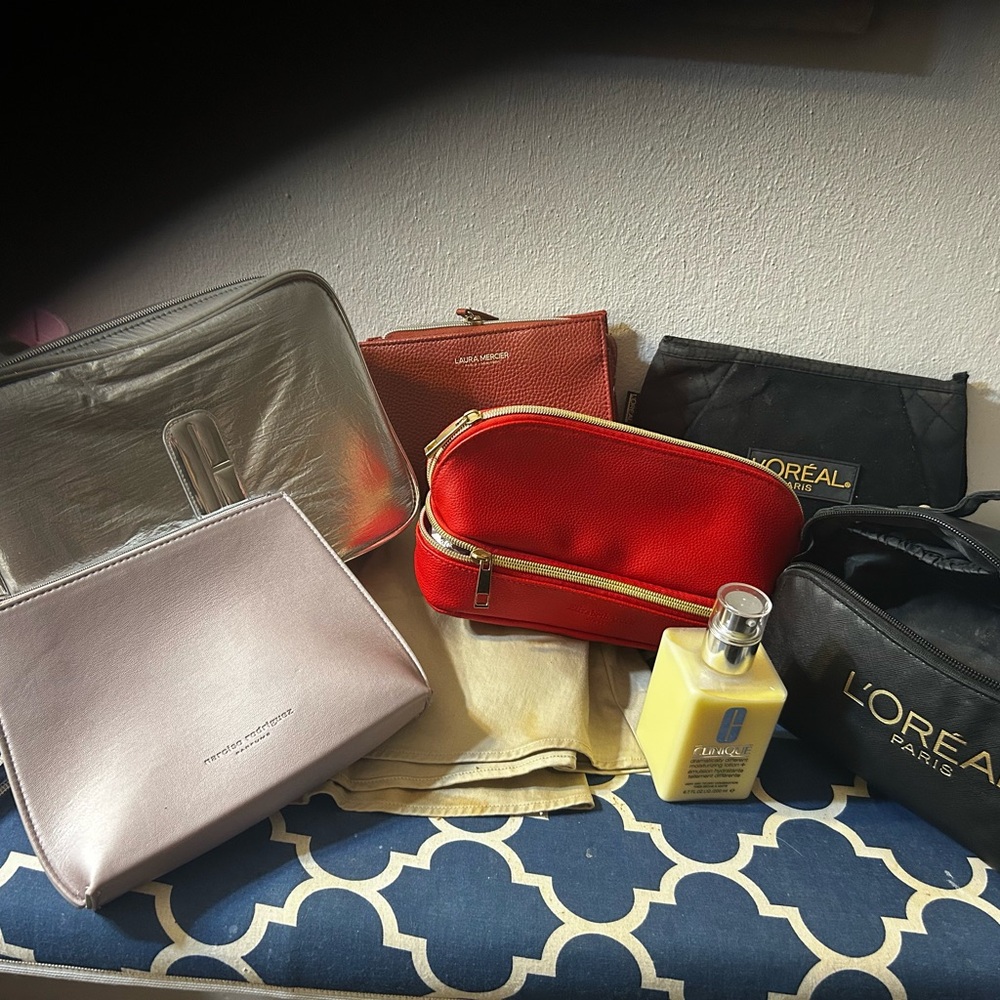 Clinique Red Leatherette Double-Zip bags al newe except the l oreal